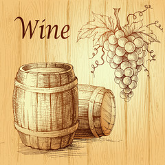 Bunch of grapes on wood background. wooden barrel. Wine lable