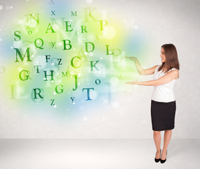 Business women with glowing letter concept