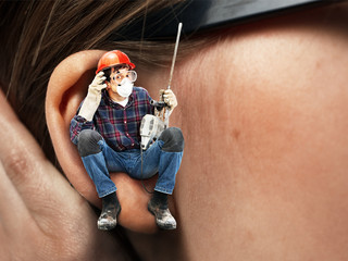 The chipping hammer in the ear