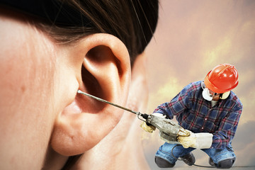 The chipping hammer in the ear