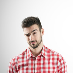 Fototapeta premium Bearded man wink with right eye. Flirt concept