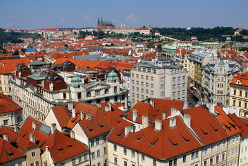 Fototapeta na wymiar Red roofs of houses in Old Central Square, Prague