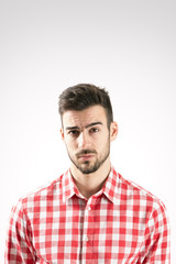 Fototapeta premium Skeptical bearded man portrait