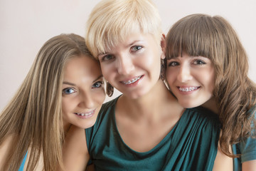 Portrait of Three Young Caucasian Girlfriends With Teeth Braces(