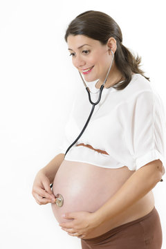 Pregnant Woman Listening her Baby