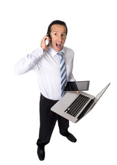 overworked senior businessman multitasking in stress
