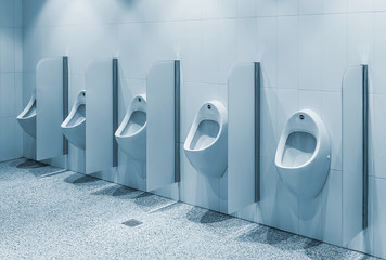 urinals in a public toilet