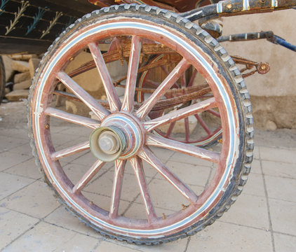 Closeup of old wooden carriage wheel