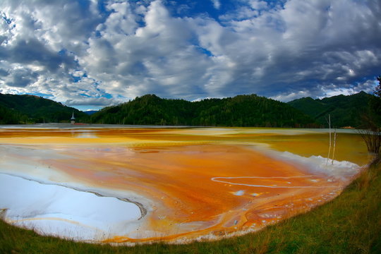 red  polluted lake  in Romania, Geamana