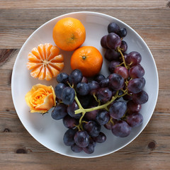 Blue grapes and mandarin oranges