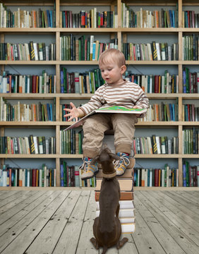 small reader and dog