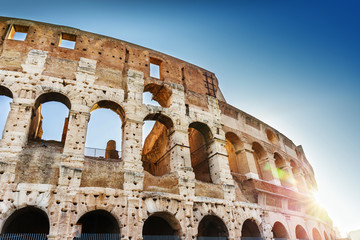 Obraz premium Close-up details of Colosseum with sunbeams. Rome, Italy
