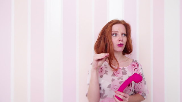 Young Woman Talking On The Telephone