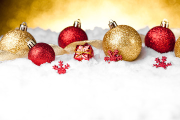 Golden and red christmas ball