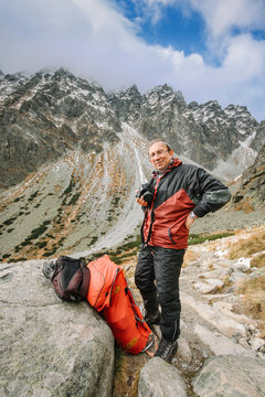 Senior Man Hiking In Mountain In High Tatras