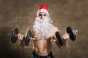 Strong Santa Claus training biceps