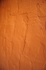 red paint texture of cement wall for background