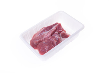 raw pork in plastic box package isolated on white background