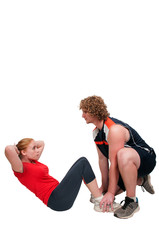 Couple doing sit ups