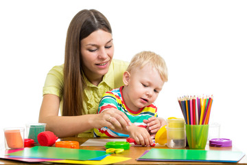 Mother and kid boy play together