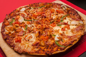 Pizza on a wooden board