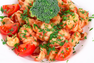 Pasta penne rigate with tomato sauce.