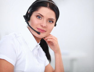 Portrait of beautiful businesswoman working at her desk with