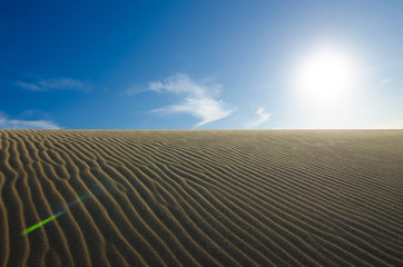 Naklejka premium sand desert and blue sky