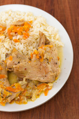 rabbit with carrot and rice on plate