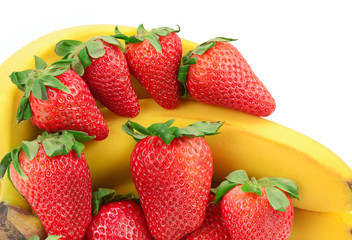 composition of banana and strawberry on white