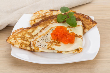Pancakes with red caviar