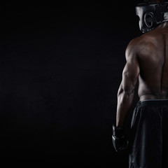 Fototapeta na wymiar Muscular young male boxer
