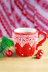Obraz na płótnie Canvas Cup of hot cocao with christmas toys and pine
