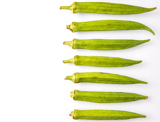 Okra or ladies' fingers vegetables over white background