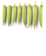 Okra or ladies' fingers vegetables over white background