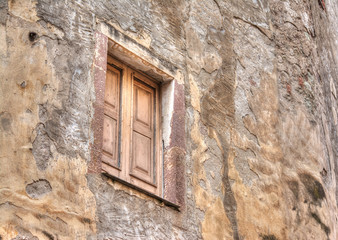 wooden window in an old wall