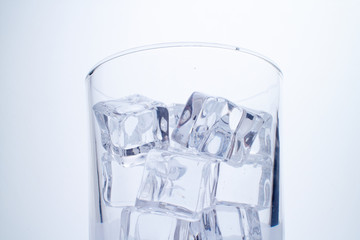 glass with ice cubes