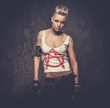 Punk girl with spiked bracelets