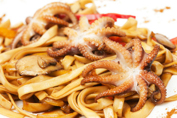 noodles with octopuses, seafood and sauce