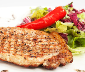 barbecue with sauce and vegetables