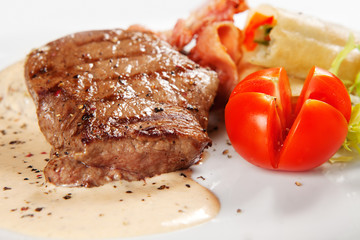 barbecue with sauce and vegetables