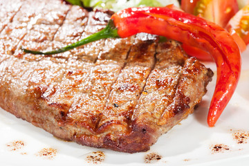 barbecue with sauce and vegetables