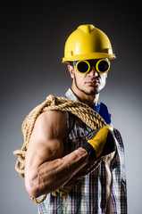 Fototapeta premium Ripped muscular builder man with tools