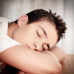 Fototapeta na wymiar Young Man sleeping