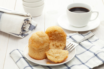 Muffins on plate with coffee