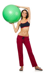 Fototapeta premium Woman exercising with ball isolated on white