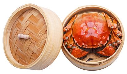 Hairy crabs in Bamboo steamer Isolated on white