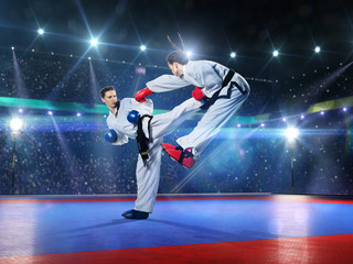 Two professional female karate fighters are fighting © 103tnn