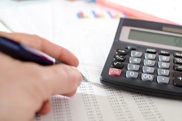 Businesswoman checking financial documents