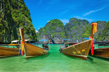 Long tail boats on famous Maya Bay on Phi Phi Islands, Thailand